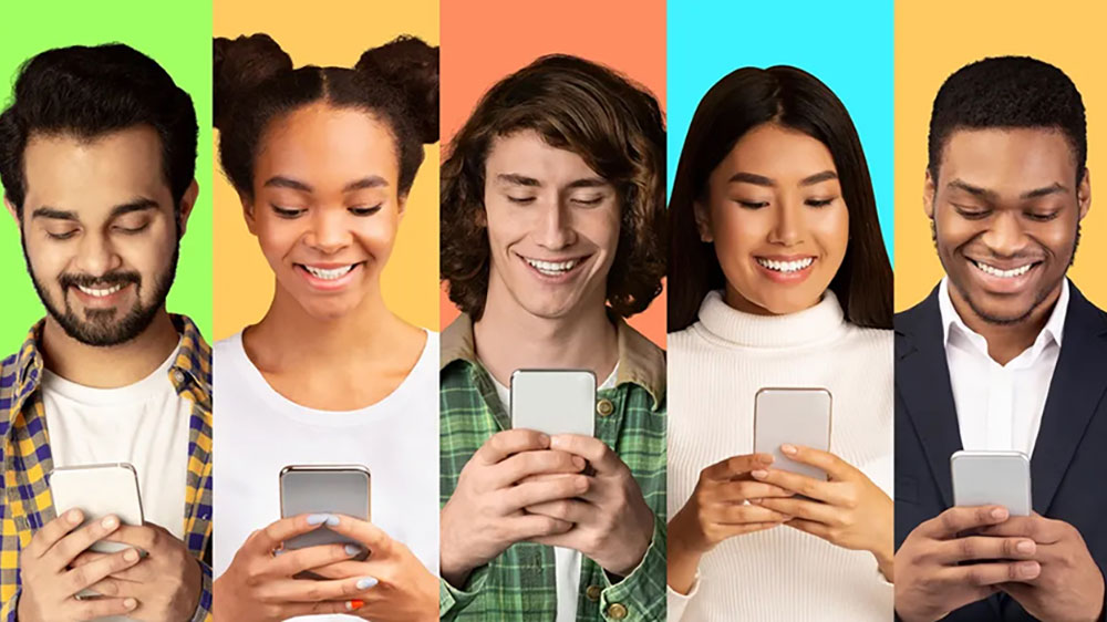 line of people over colorful backgrounds looking down at their smartphones