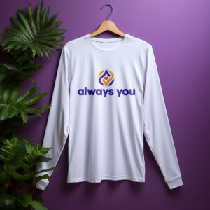 White long-sleeve t-shirt with Always You logo hanging on a wooden hanger with a purple wall background and a green plant on the left