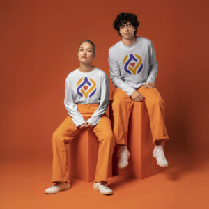 2 young adults wearing their white long-sleeve t-shirts with Always You graphic logos and orange pants, sitting on orange rectangular boxes in front of an orange background