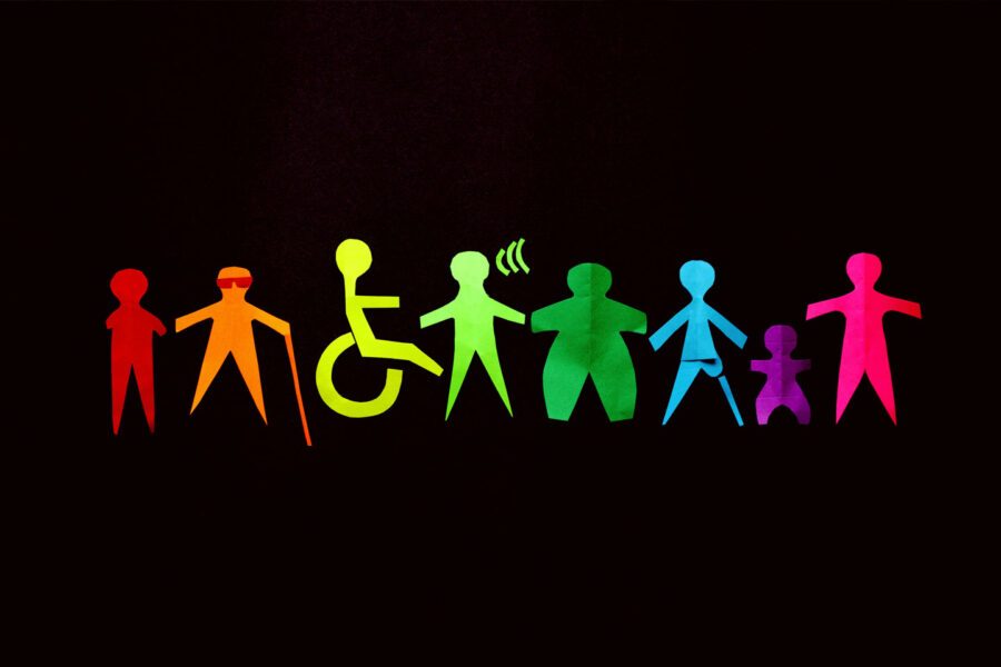 black background with rainbow silhouette cutouts of people with and without visual disabilities