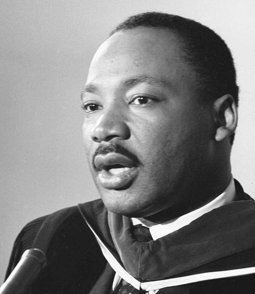 black & white photo of Dr. Martin Luther King, Jr. speaking